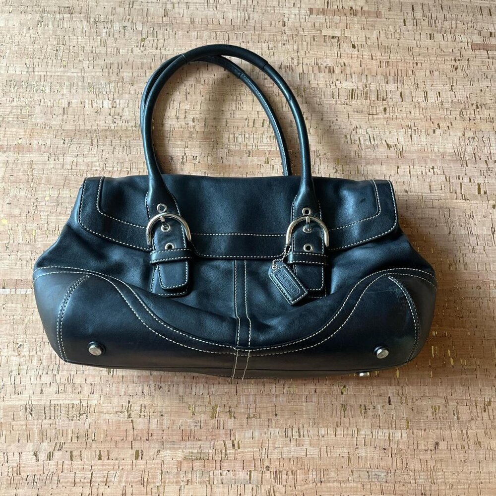 vintage coach black leather bag with silver hardware, featuring a zipper pocket